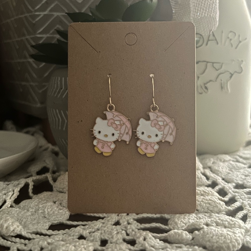 *3 for $20* Hello Kitty Raincoat and Umbrella Earrings